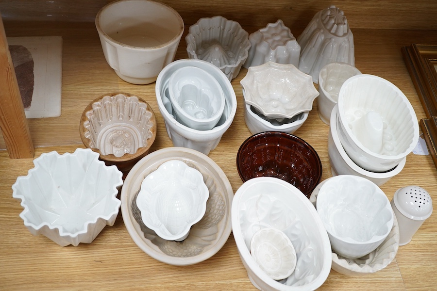 Twenty early 20th century ceramic jelly moulds, including an example by Shelley, etc. Condition - fair